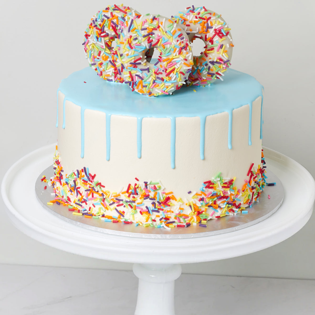Donut and Sprinkles Drip Birthday Cake | Susie's Cakes